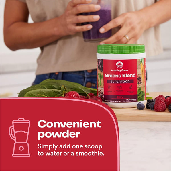Spoonful of NutriGreens Superfood Blend powder highlighting its fine texture and freshness.