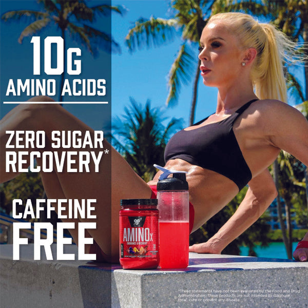 Close-up of AminoX powder, highlighting its micronized BCAAs and essential amino acids for muscle recovery.