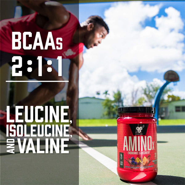 Athlete mixing BSN AminoX in shaker bottle post workout, reflecting top rated amino acid supplement for athletes