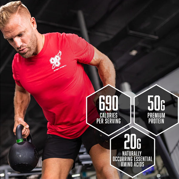 Athlete mixing BSN True-Mass protein powder with water for muscle recovery