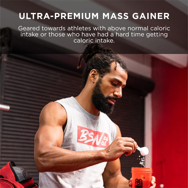 BSN True-Mass mass gainer shake in a glass showing creamy texture and flavor