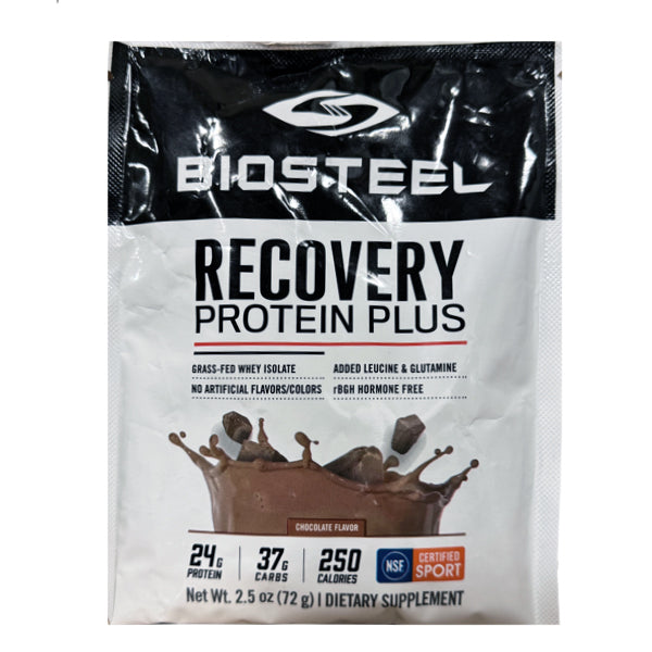 Close-up of recovery protein powder being mixed in a shaker cup for post workout nutrition.