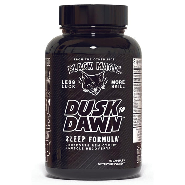 Black Magic Dusk To Dawn capsules on a nightstand, promoting restful sleep and muscle recovery