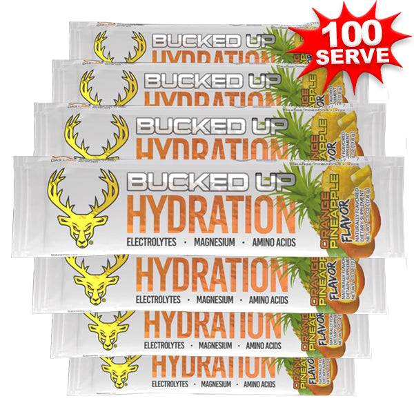 A scoop of Bucked Up Electrolyte Hydration Powder being mixed in water for instant hydration.