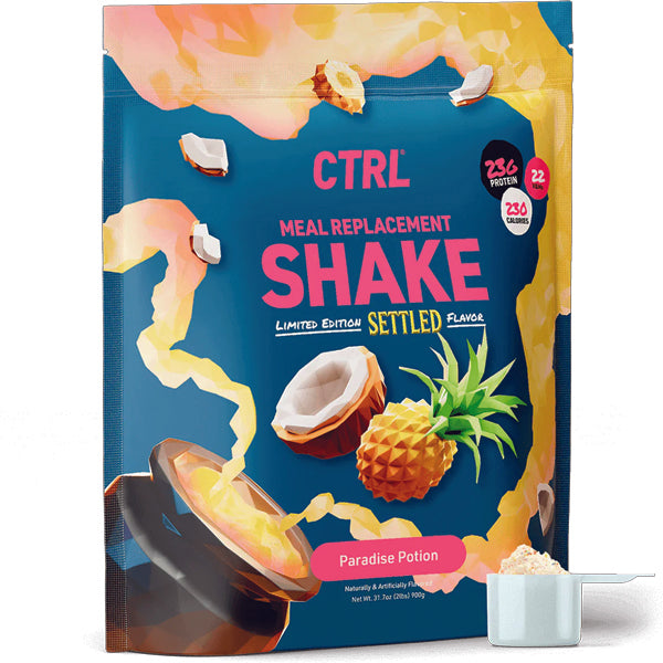 Close-up of a healthy protein shake with cereal pieces in a glass