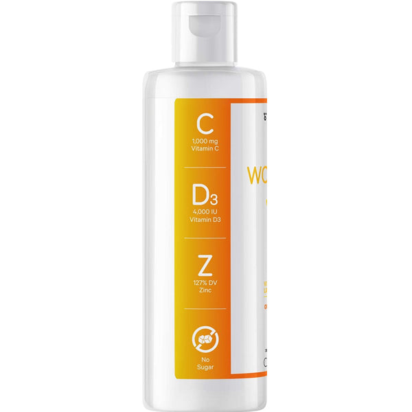 Close-up of liquid vitamins highlighting the quality ingredients including zinc and D3.