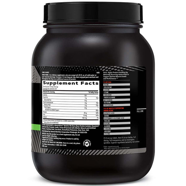 Athlete mixing plant-based protein powder in a shaker bottle for muscle recovery