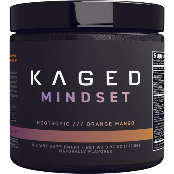 Kaged Mindset cognitive booster supplement on a desk with a laptop, ideal for enhancing focus and memory.