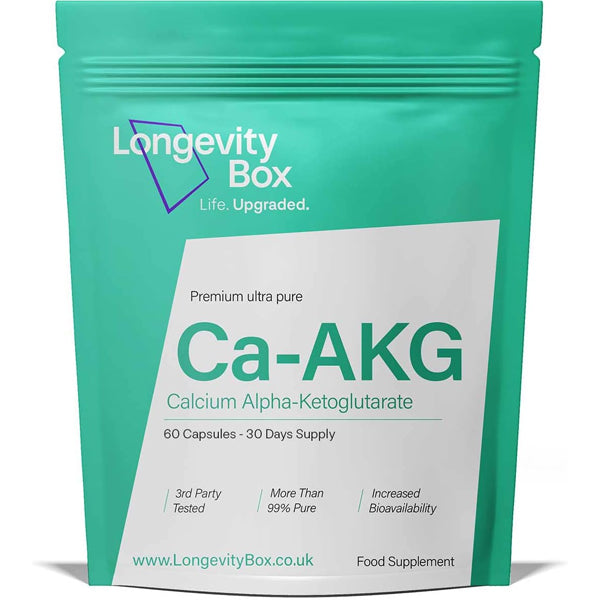 Close-up of CoreVital calcium AKG capsules with clean labeling for longevity support.