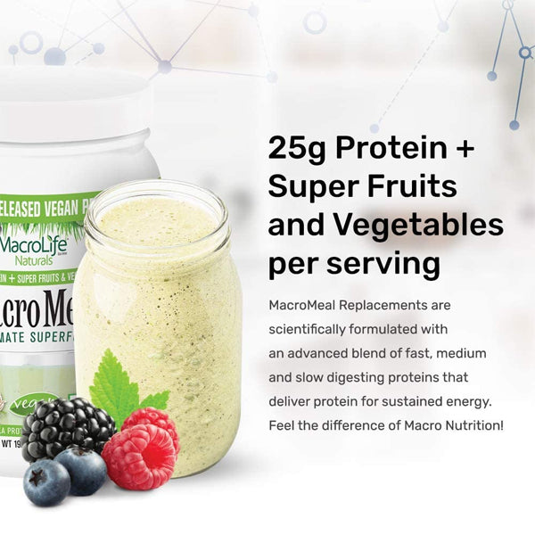 Scoop of MacroMeal Vegan Protein powder next to fruits and greens, perfect for a nutritious meal replacement.