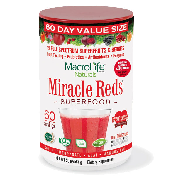 Miracle Reds superfood blend powder in a bowl, showcasing its vibrant color and texture.