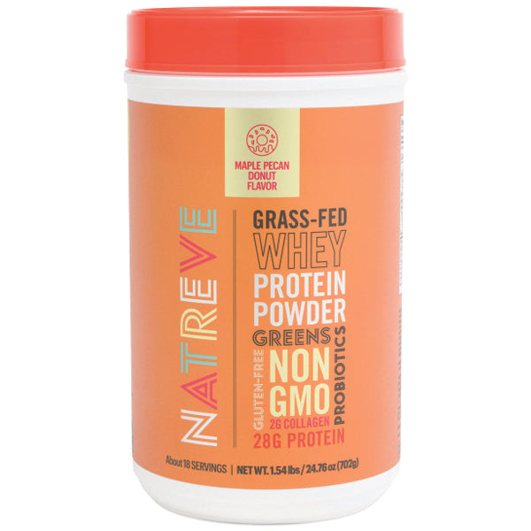 Close-up of organic grass fed isolate protein powder scoop with fresh vegetables