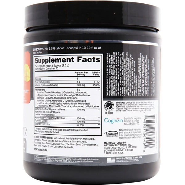 Close-up of the supplement mix with a glass of water, highlighting its ingredients for muscle recovery
