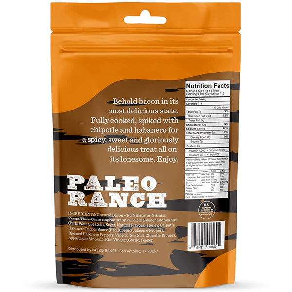 Hand holding a piece of bacon jerky with a backdrop of outdoor scenery, ideal for on-the-go snacking