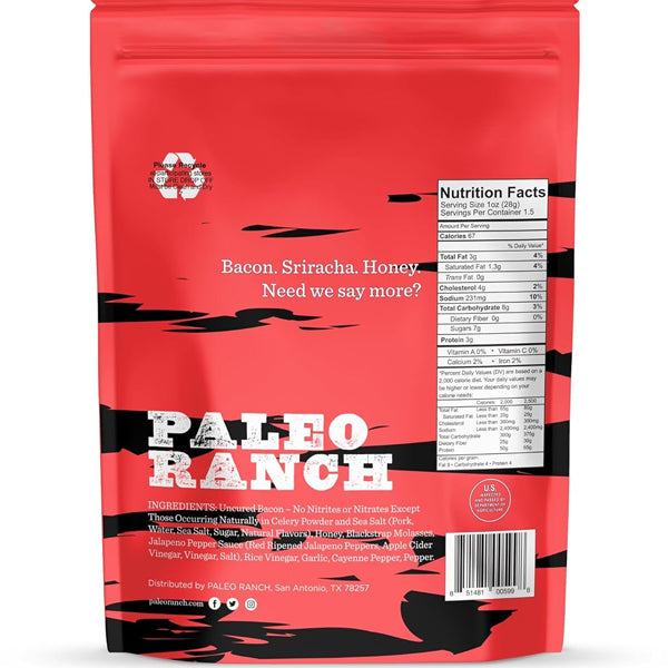 Paleo Ranch uncured pork bacon jerky slices on a wooden surface, highlighting their flavor and texture