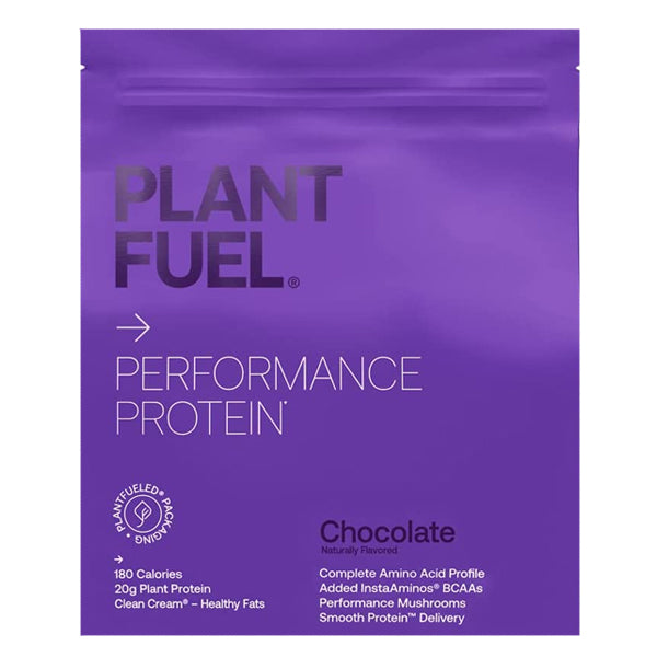 Scoop of Plant Fuel Performance Protein Powder in a fitness setting.