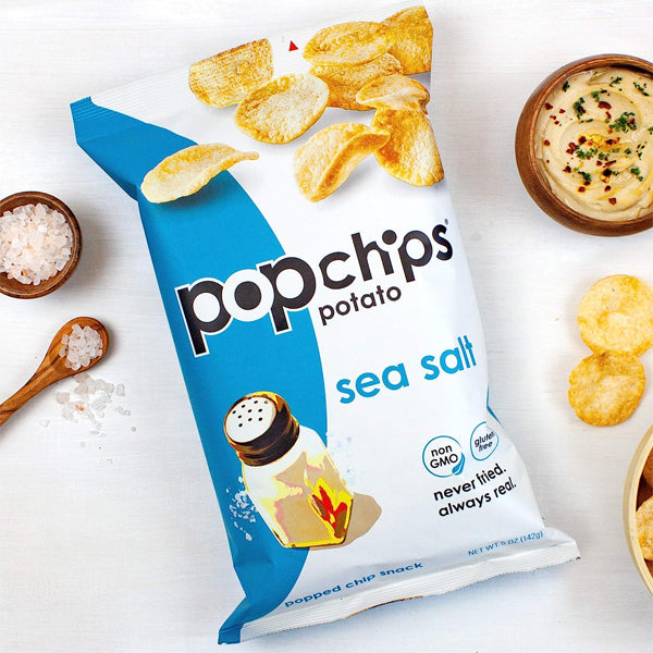 A handful of low fat chips on a plate, perfect for party snacks