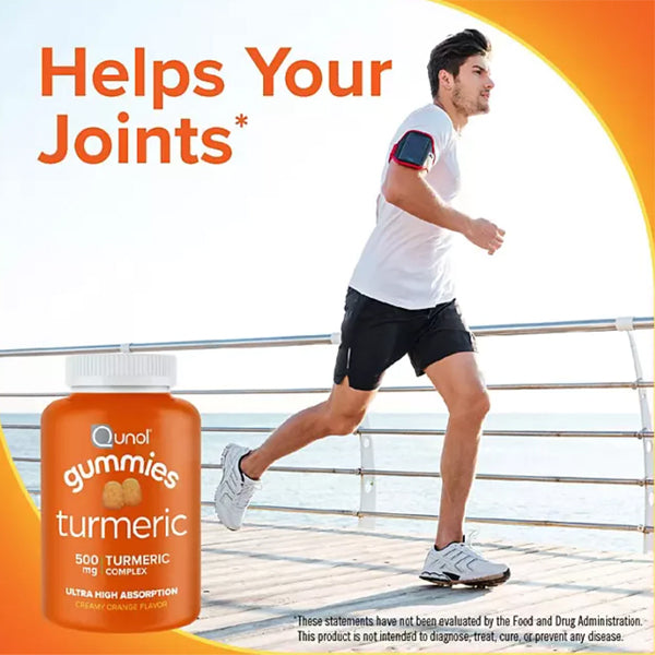 An array of turmeric gummies on a wooden surface, highlighting their natural ingredients and non-GMO certification.