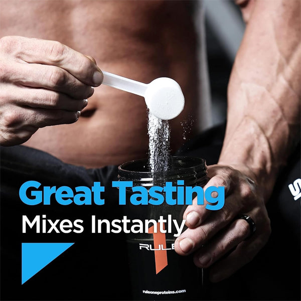 Close-up of a scoop of whey protein powder on a gym bench