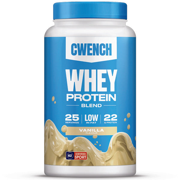 Athlete mixing whey protein powder into a shaker bottle after workout