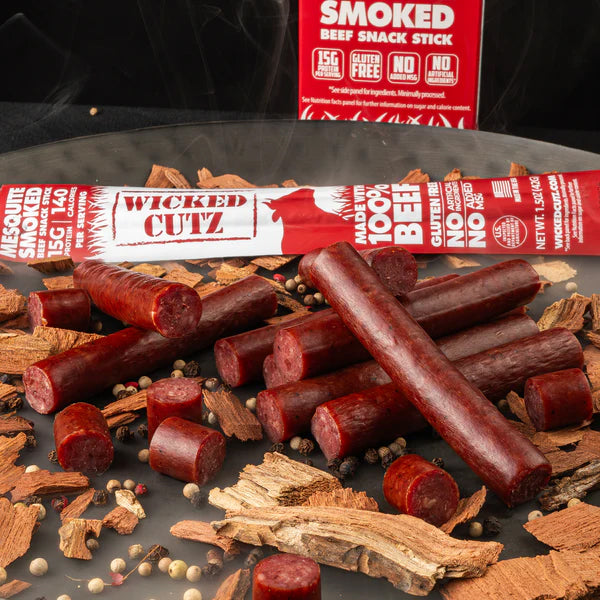 High-resolution image of seasoned beef snack sticks in a rustic setting, emphasizing natural ingredients and flavor