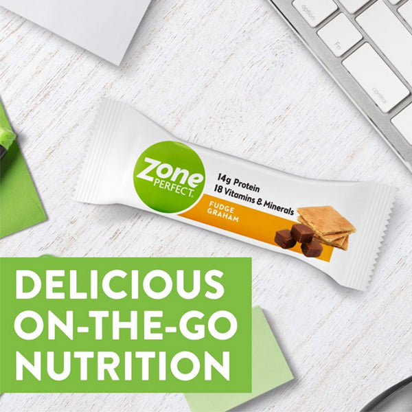 Assorted flavors of ZonePerfect protein bars on a table, ideal for healthy snacks