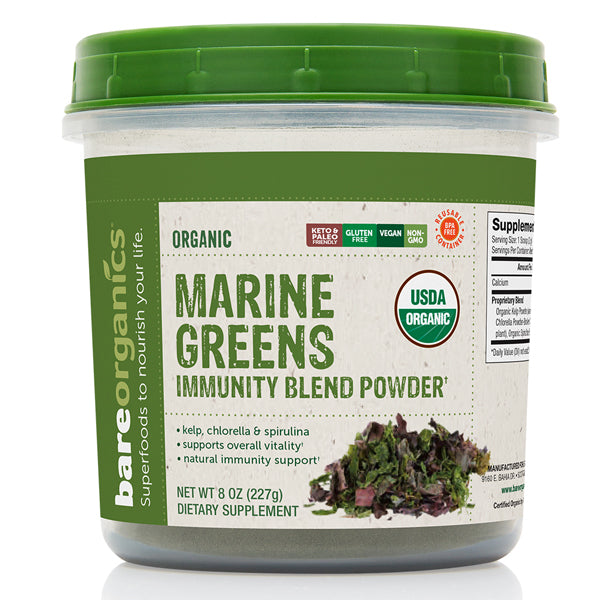 Close-up of Organic Marine Greens Immunity Blend Powder in a BPA-free jar.