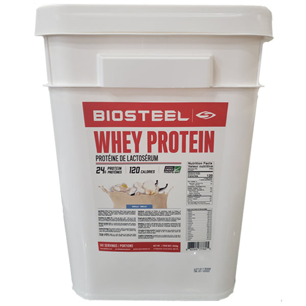 Scoop of BioSteel Whey Protein powder on a fitness bench, ready for post-workout nutrition.