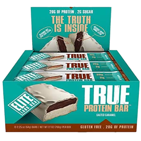 Elite Labs USA Triple-Layer Protein Bar in a hand, showcasing its delicious layers.