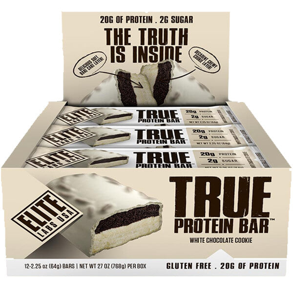 Close-up of Elite Labs USA Triple-Layer Protein Bar with a bite taken, revealing its soft texture.