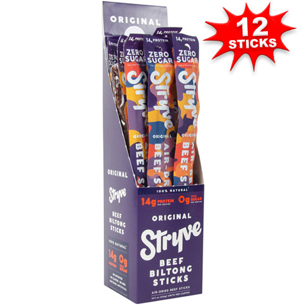 Person enjoying Stryve Biltong Beef Stick outdoors, reflecting an active lifestyle.
