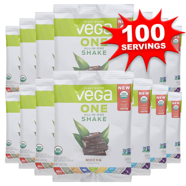 Vega One Organic Shake in a glass with fresh fruits, showcasing its vibrant color and texture.