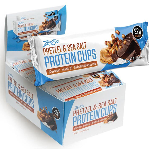 ZenEvo protein cups stacked, showcasing their rich dark chocolate exterior and creamy peanut butter filling.