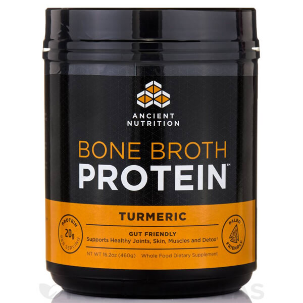 Close-up of bone broth protein powder in a jar with a spoon